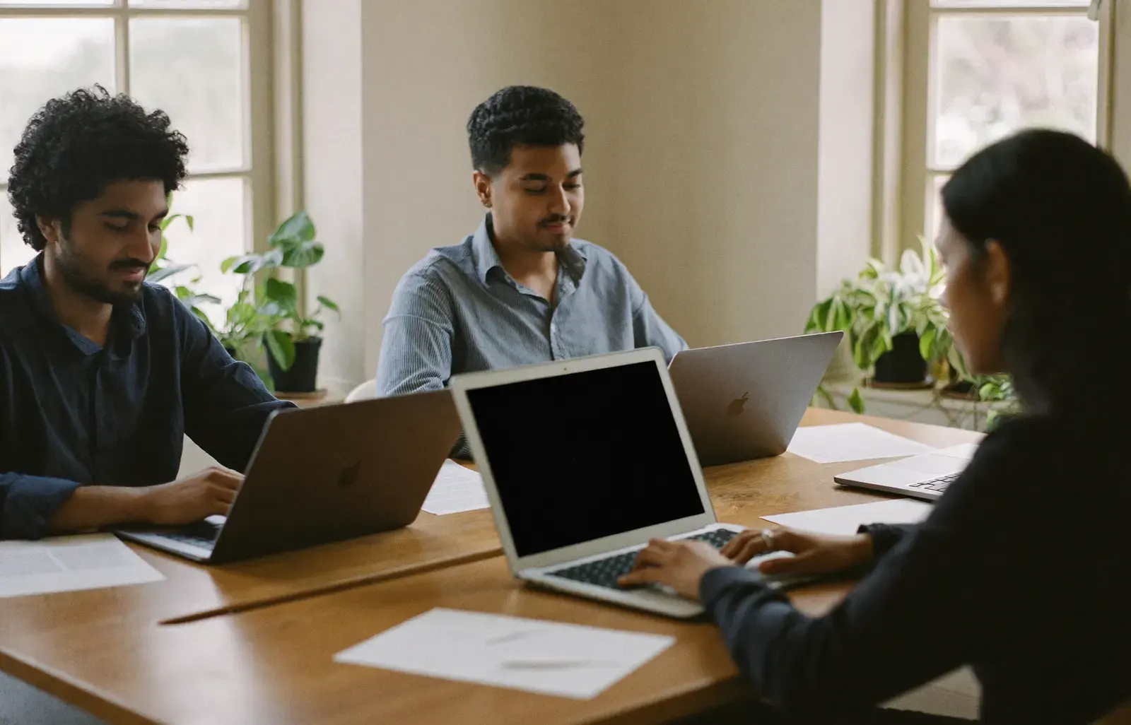 Colleagues working together in a small office